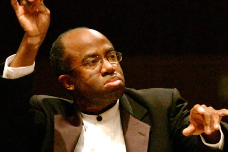 Michael Morgan conducting during his long and impactful career. Conductor Michael Morgan