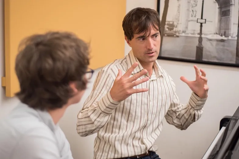 SFCM Faculty Member, Mason Bates, teaching a student