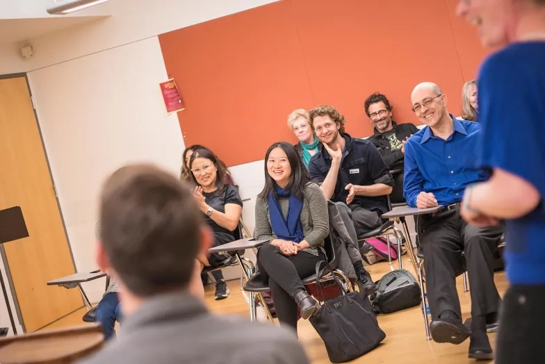 A classroom full of adults continuing their education