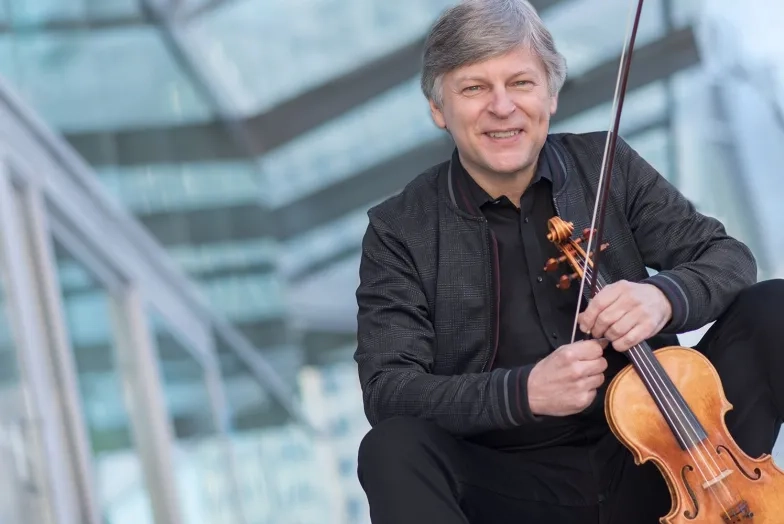 Simon James with violin made by Jean Baptiste Vuillaume in 1827