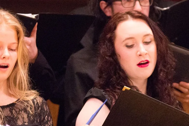 An SFCM student singing in the chorus