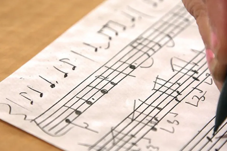 Some staff paper with music on it