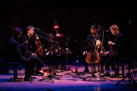 A quintet performs Steve Horowitz's "The Order of Time."