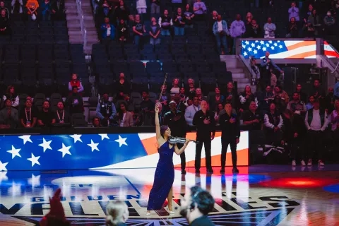 Rose Crelli performs the national anthem at Chase Center in May.