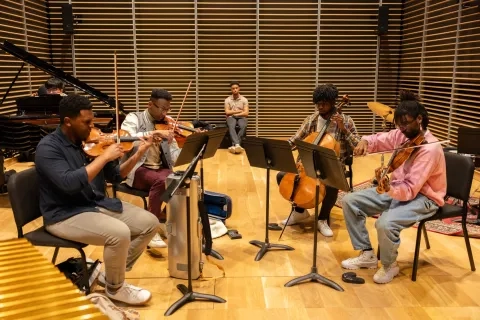 A string quartet rehearses for a concert put on by SFCM's Black Student Union.