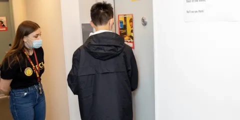 student on their dorm floor during orientation