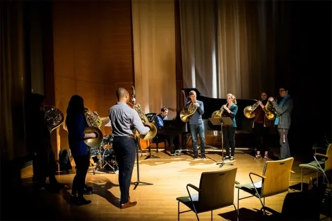 Students performing their Winter Term in Osher Salon at 50 Oak St.