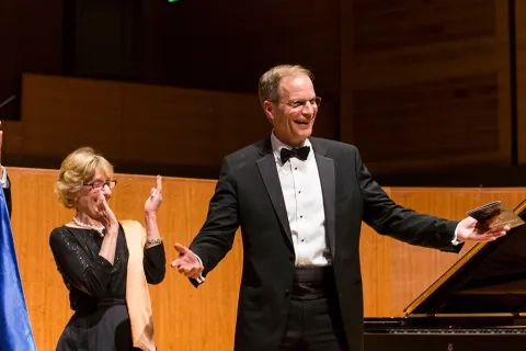 members of trustees board celebrate 2016 giving annual report at 50 oak street campus caroline h. hume concert hall