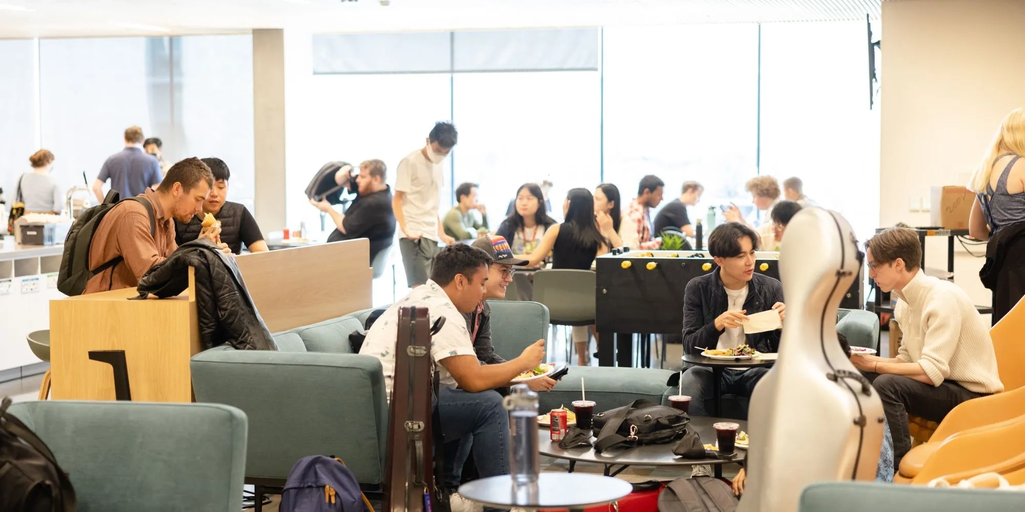 a crowded cafe/lounge area on the first day of classes in the bowes center